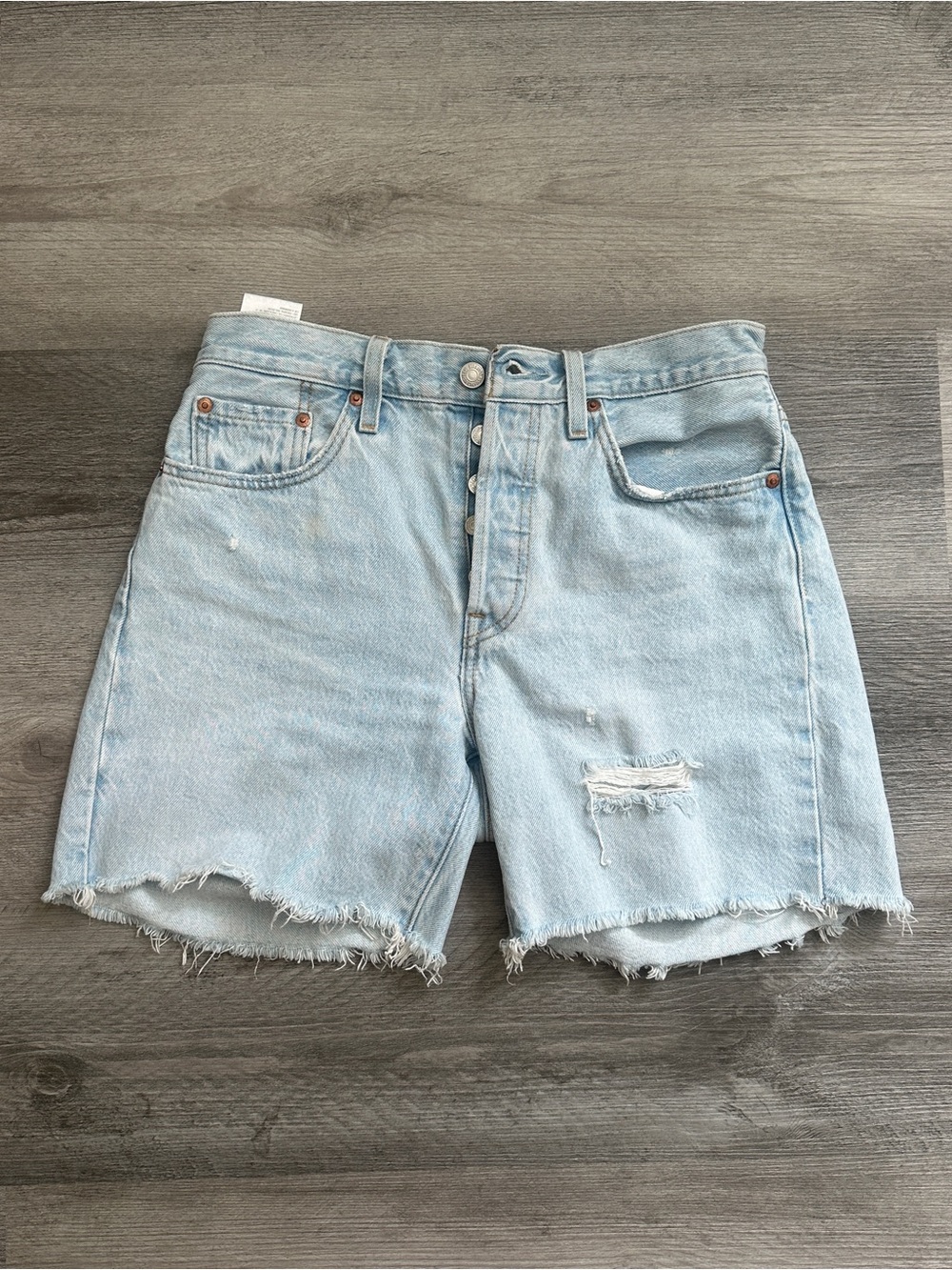 Levi’s 501 Light Blue Distressed Denim Shorts